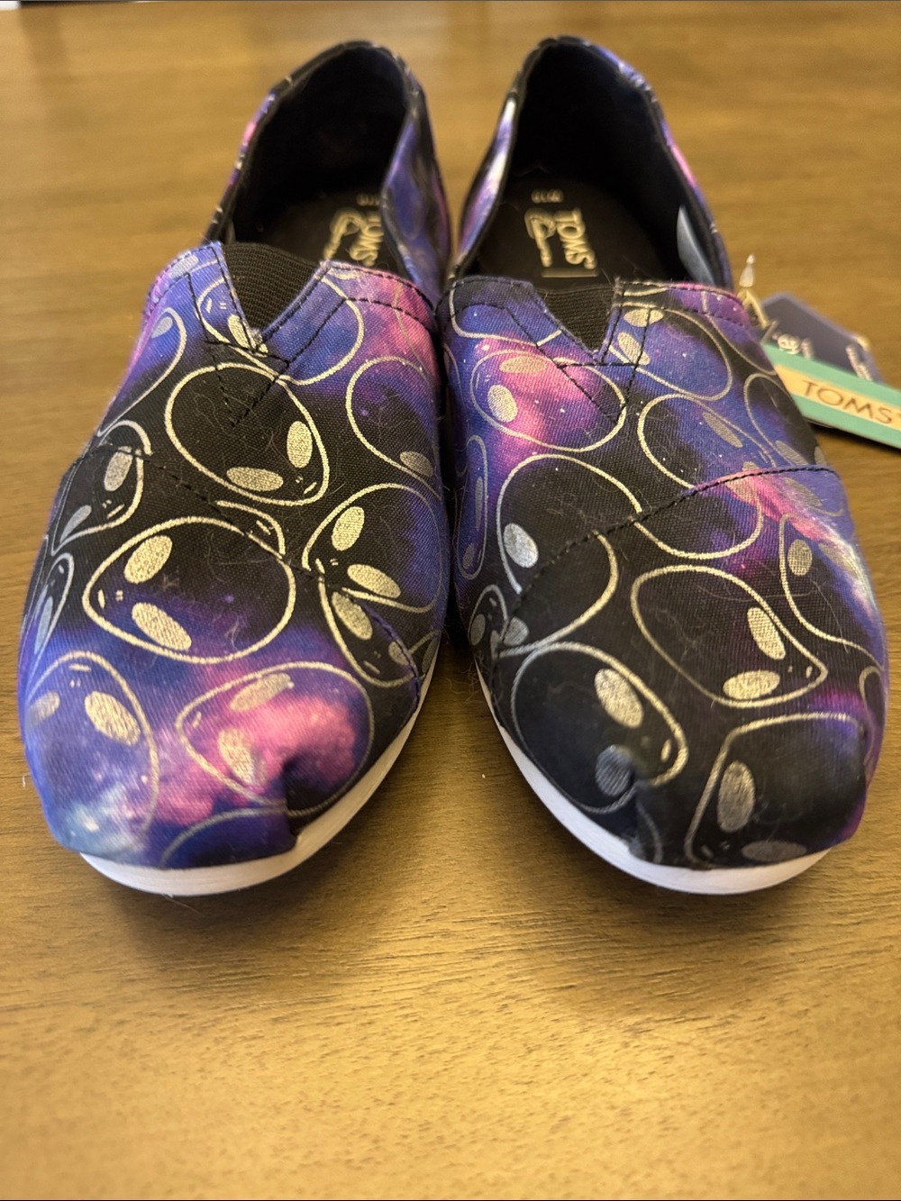 Toms Women’s Alien Galaxy Slip-On Sneakers in Purple, Black and Pink